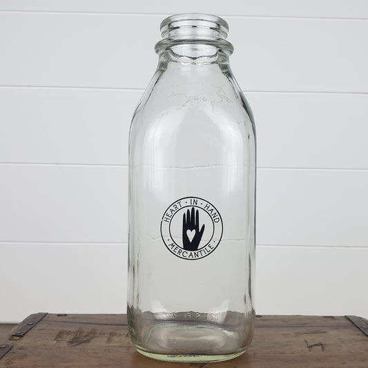 Old-fashioned Quart milk bottle with Heart in Hand Mercantile Logo. Screen printed in the USA.