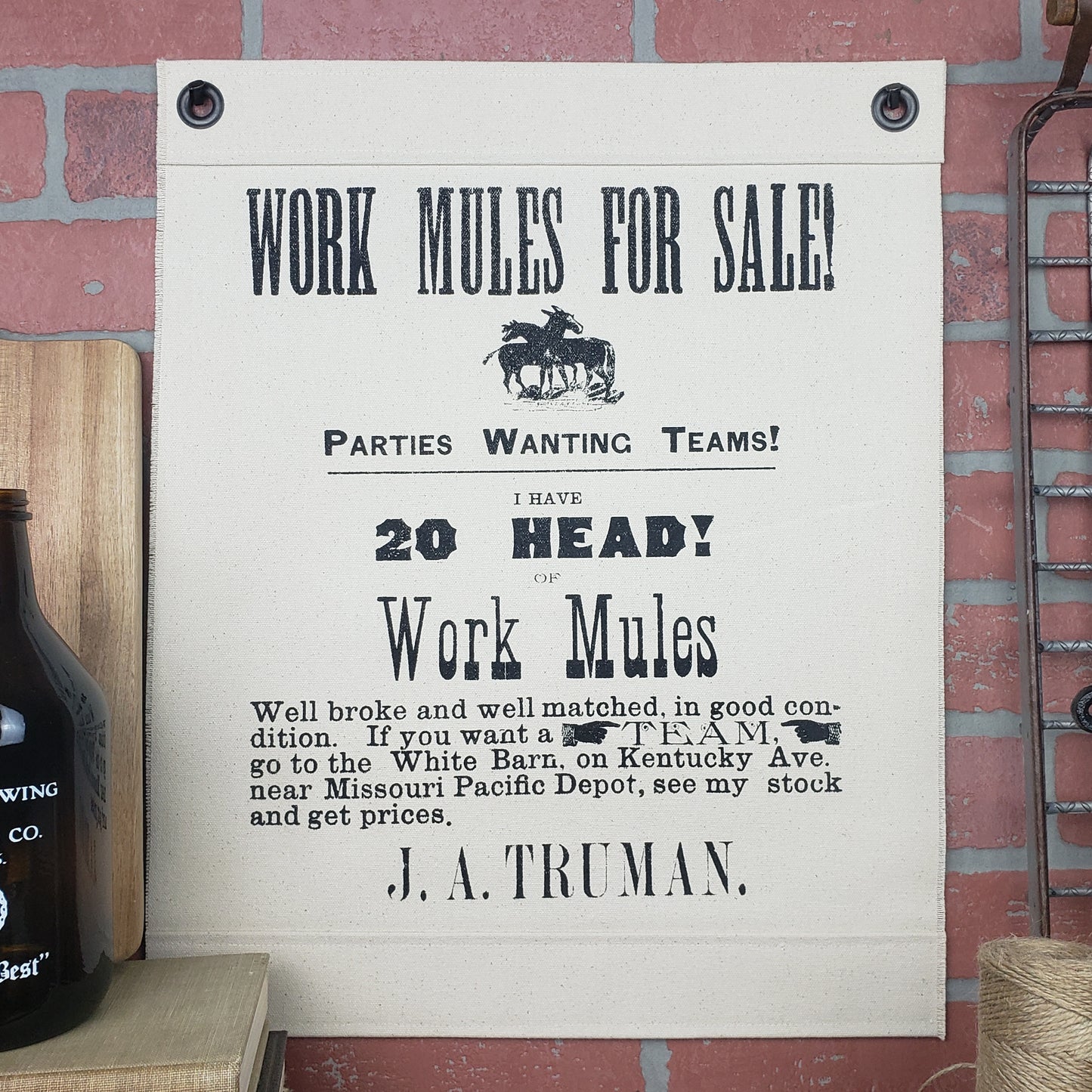 Vintage image of  a "Work Mules For Sale" poster, originally printed in 1884 by merchant J A Truman, President Harry Truman's father! Screen printed on our Inked Canvas wall hanging for wall decor or wall art. Hand made in the USA by Heart in Hand Mercantile using natural, unbleached 100% Cotton Heavy Duck Canvas.