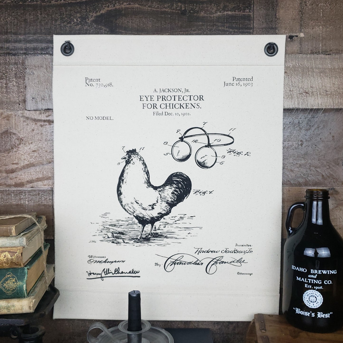 Inked Canvas wall hanging or wall decor art featuring a screen printed vintage image of the patent for Eye Protection for Chickens c.1902. Individually hand made in the USA using natural, unbleached 100% Cotton Heavy Duck Canvas  and hung by two grommets. Two antique reproduction square nails included.