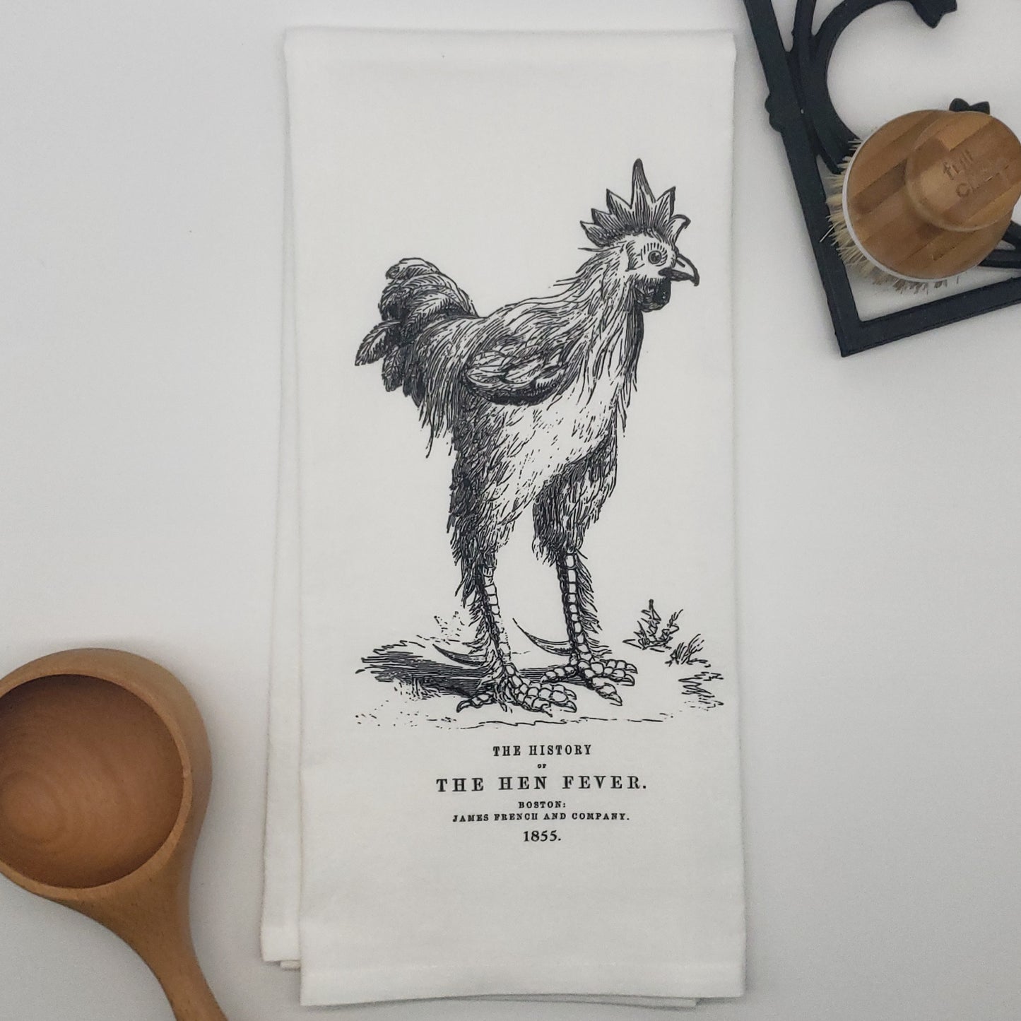 100% cotton kitchen, bar or bathroom tea towel printed with the long-legged chicken from "The Hen Fever", published in 1855. The book could have been written today with the resurgence of raising chickens! White towel, 19"x28", hanging loop in top corner. Designed, printed, made in the USA by Heart in Hand Mercantile.